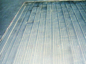 Griding grooves into concrete